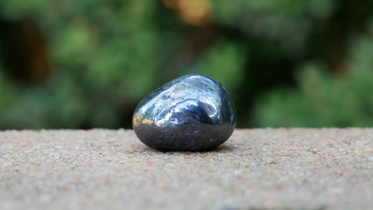 Tumbled hematite stone.